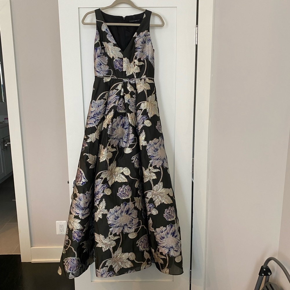 Floor length gown with floral embroidery